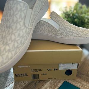 Michael Kors size 8 slip on shoes. Worn a handful of time, great condition.